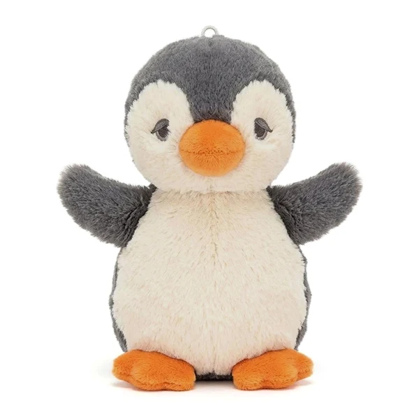 Peluche de pingüino gris y crema con pico y patas naranjas